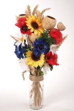 Bouquet of artificial poppy flowers, sunflowers, daisies and dried exotic flowers