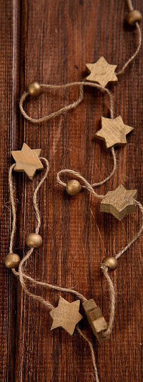 Garland of wooden gold stars on string 250cm