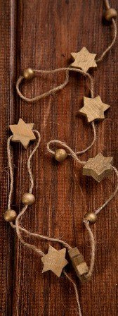 Garland of wooden gold stars on string 250cm