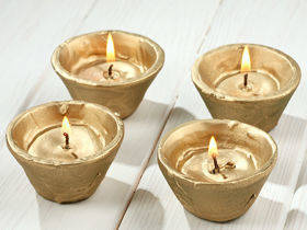 Set von 4 goldenen Kerzen